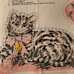 1976 stuffed cat and dog fabric.